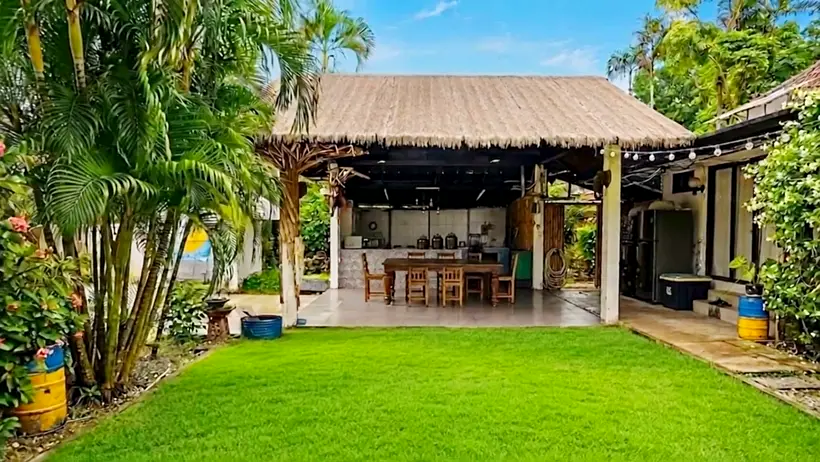 The open-air shared kitchen with its long table