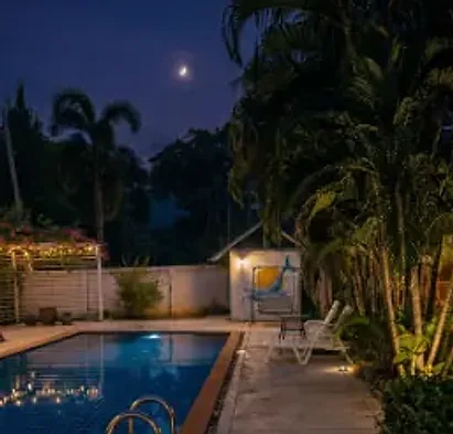 The pool lit up at night